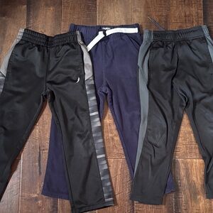Three pants OshKosh, champion, exertek. Used condition but still good.